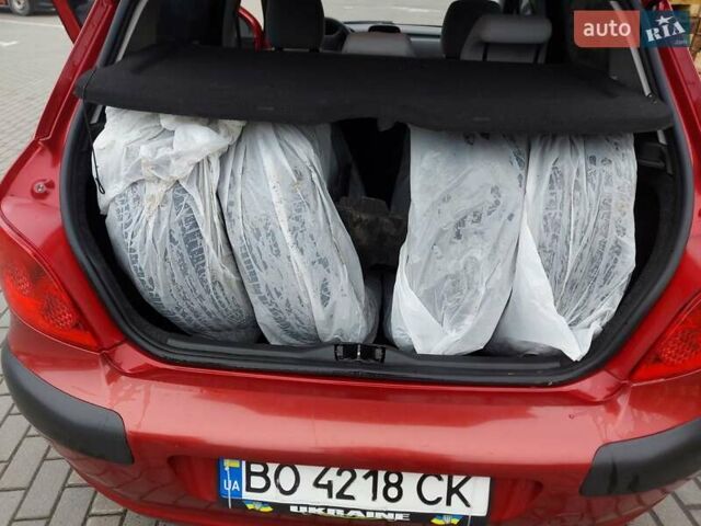 Червоний Пежо 307, об'ємом двигуна 1.4 л та пробігом 184 тис. км за 3350 $, фото 18 на Automoto.ua