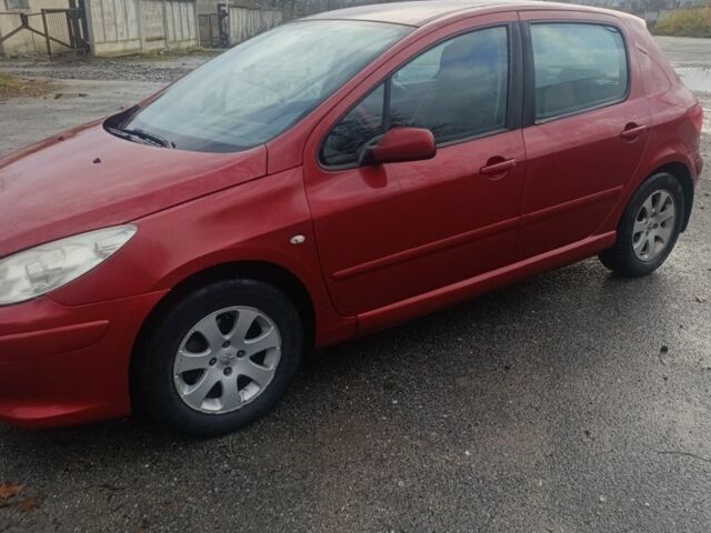 Красный Пежо 307, объемом двигателя 2 л и пробегом 315 тыс. км за 3500 $, фото 2 на Automoto.ua