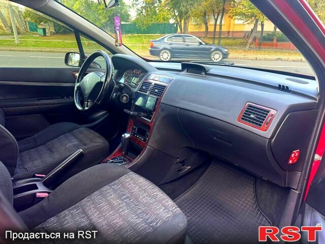 Красный Пежо 307, объемом двигателя 2 л и пробегом 215 тыс. км за 4299 $, фото 6 на Automoto.ua