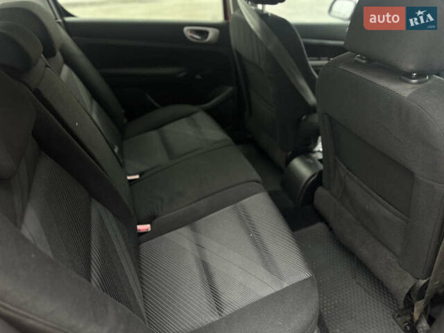 Красный Пежо 307, объемом двигателя 2 л и пробегом 189 тыс. км за 4500 $, фото 20 на Automoto.ua