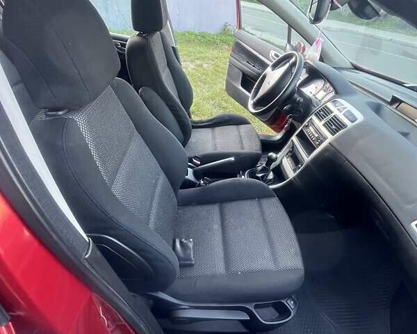 Красный Пежо 307, объемом двигателя 2 л и пробегом 225 тыс. км за 4000 $, фото 12 на Automoto.ua