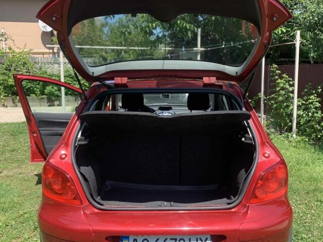 Красный Пежо 307, объемом двигателя 2 л и пробегом 206 тыс. км за 4400 $, фото 3 на Automoto.ua