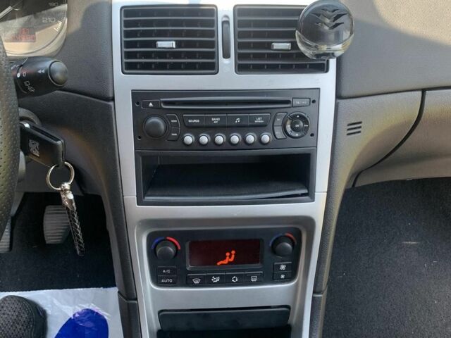 Красный Пежо 307, объемом двигателя 2 л и пробегом 206 тыс. км за 4400 $, фото 13 на Automoto.ua