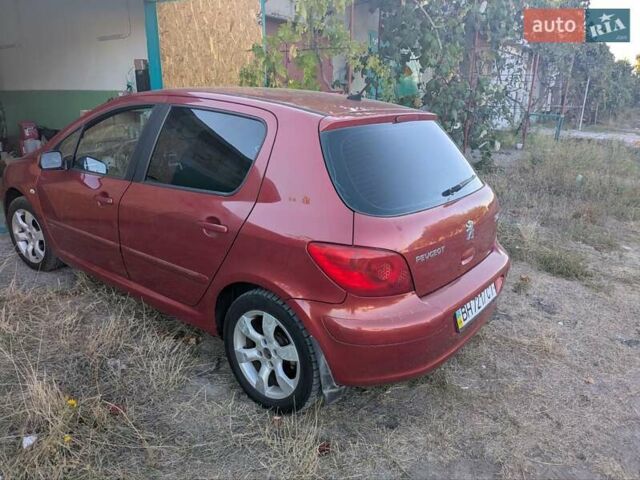 Красный Пежо 307, объемом двигателя 2 л и пробегом 275 тыс. км за 4500 $, фото 6 на Automoto.ua