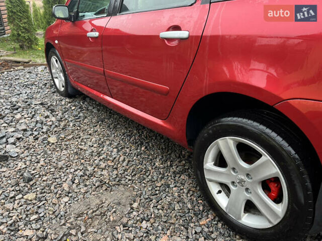Червоний Пежо 307, об'ємом двигуна 2 л та пробігом 320 тис. км за 2100 $, фото 5 на Automoto.ua