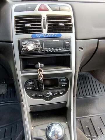 Красный Пежо 307, объемом двигателя 1.6 л и пробегом 286 тыс. км за 3600 $, фото 7 на Automoto.ua