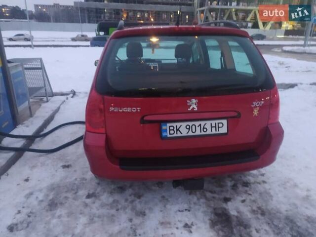 Красный Пежо 307, объемом двигателя 1.6 л и пробегом 300 тыс. км за 4800 $, фото 19 на Automoto.ua