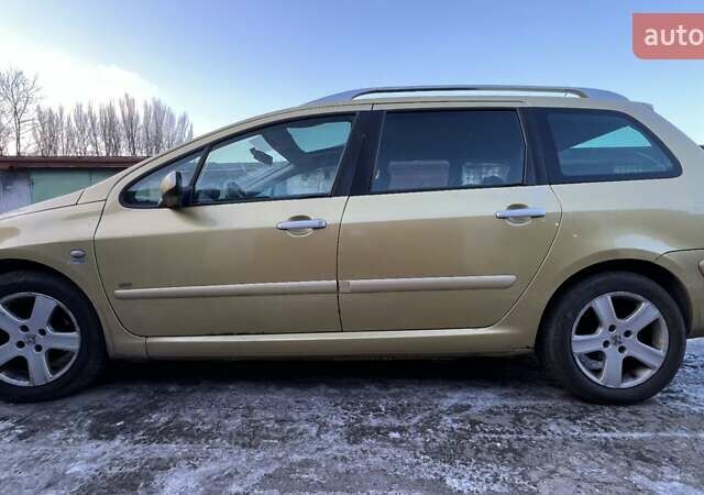 Желтый Пежо 307, объемом двигателя 2 л и пробегом 334 тыс. км за 3700 $, фото 5 на Automoto.ua