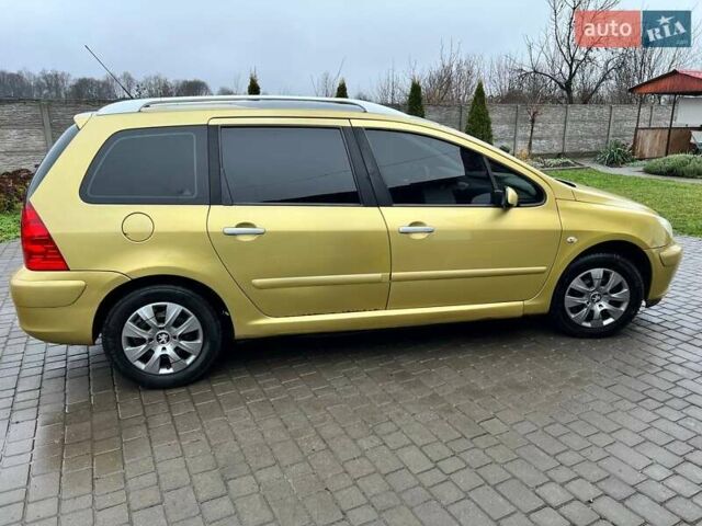 Желтый Пежо 307, объемом двигателя 1.6 л и пробегом 204 тыс. км за 3950 $, фото 10 на Automoto.ua