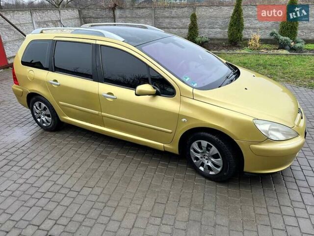 Желтый Пежо 307, объемом двигателя 1.6 л и пробегом 204 тыс. км за 3950 $, фото 9 на Automoto.ua