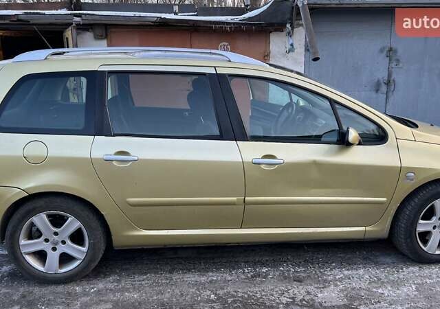 Желтый Пежо 307, объемом двигателя 2 л и пробегом 334 тыс. км за 3700 $, фото 3 на Automoto.ua