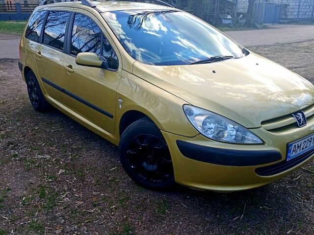 Желтый Пежо 307, объемом двигателя 1.4 л и пробегом 301 тыс. км за 4300 $, фото 1 на Automoto.ua