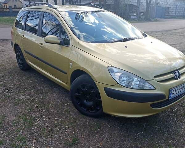 Желтый Пежо 307, объемом двигателя 1.36 л и пробегом 301 тыс. км за 3950 $, фото 7 на Automoto.ua