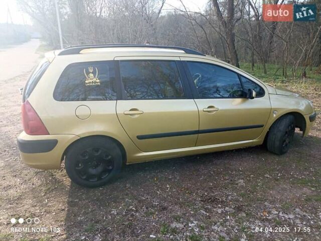 Желтый Пежо 307, объемом двигателя 1.36 л и пробегом 301 тыс. км за 3950 $, фото 8 на Automoto.ua