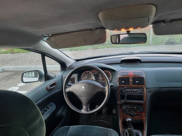 Серый Пежо 307, объемом двигателя 2 л и пробегом 300 тыс. км за 2550 $, фото 4 на Automoto.ua