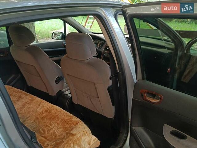 Серый Пежо 307, объемом двигателя 2 л и пробегом 260 тыс. км за 3500 $, фото 4 на Automoto.ua