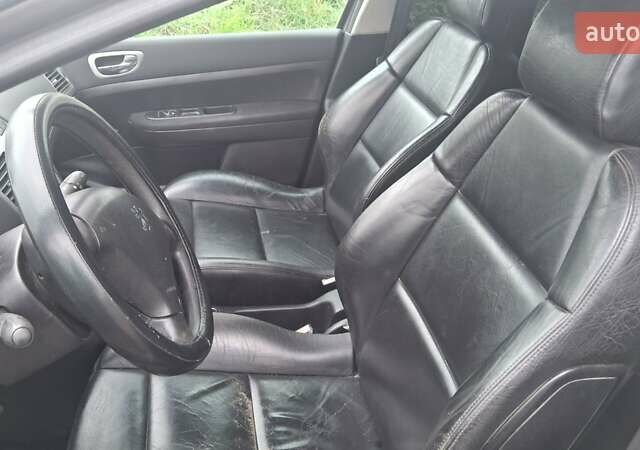 Серый Пежо 307, объемом двигателя 2 л и пробегом 328 тыс. км за 3000 $, фото 3 на Automoto.ua