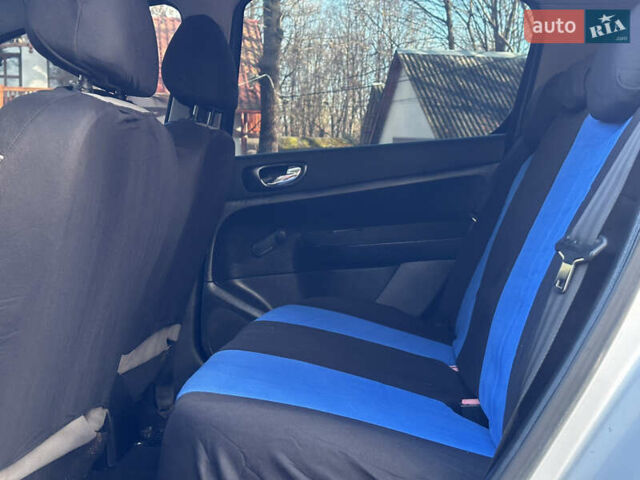 Сірий Пежо 307, об'ємом двигуна 1.4 л та пробігом 380 тис. км за 2999 $, фото 67 на Automoto.ua