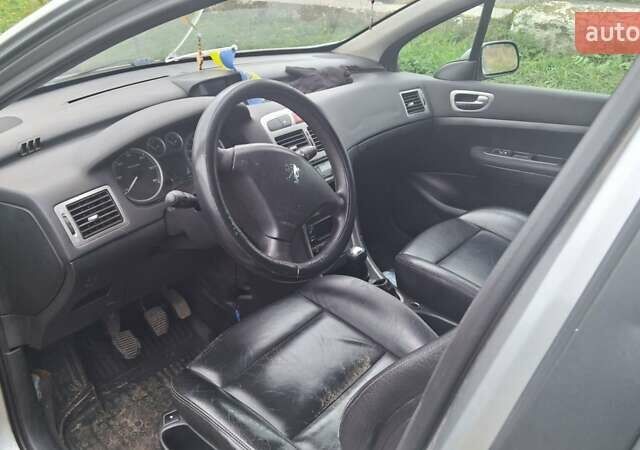 Серый Пежо 307, объемом двигателя 2 л и пробегом 328 тыс. км за 3000 $, фото 2 на Automoto.ua