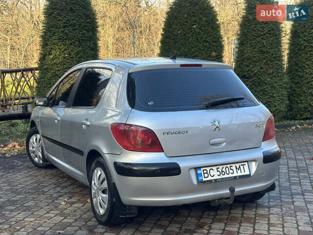 Сірий Пежо 307, об'ємом двигуна 1.4 л та пробігом 380 тис. км за 2999 $, фото 43 на Automoto.ua