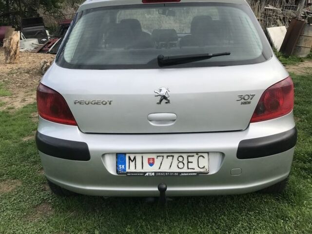 Сірий Пежо 307, об'ємом двигуна 1.4 л та пробігом 380 тис. км за 1500 $, фото 1 на Automoto.ua