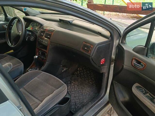 Серый Пежо 307, объемом двигателя 2 л и пробегом 260 тыс. км за 3500 $, фото 2 на Automoto.ua