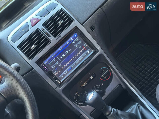 Сірий Пежо 307, об'ємом двигуна 1.4 л та пробігом 380 тис. км за 2999 $, фото 59 на Automoto.ua