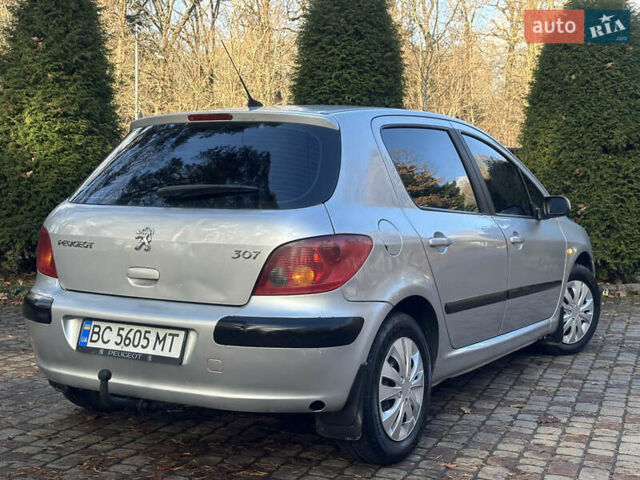 Сірий Пежо 307, об'ємом двигуна 1.4 л та пробігом 380 тис. км за 2999 $, фото 44 на Automoto.ua