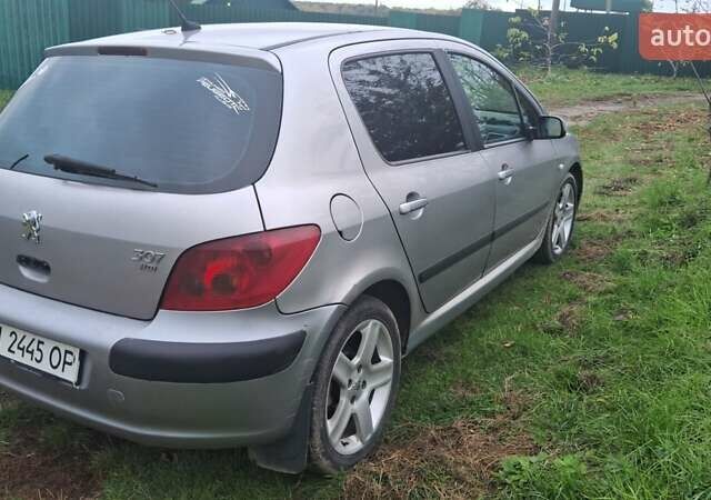 Серый Пежо 307, объемом двигателя 2 л и пробегом 328 тыс. км за 3000 $, фото 5 на Automoto.ua