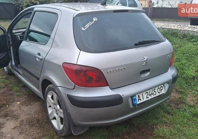 Серый Пежо 307, объемом двигателя 2 л и пробегом 328 тыс. км за 3000 $, фото 4 на Automoto.ua