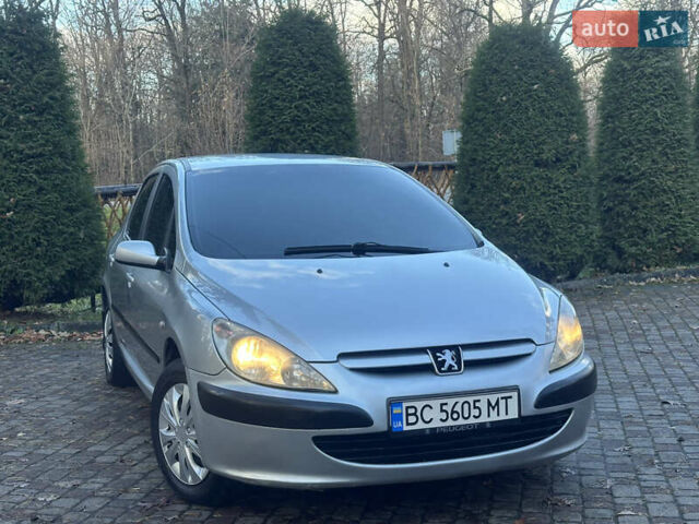 Сірий Пежо 307, об'ємом двигуна 1.4 л та пробігом 380 тис. км за 2999 $, фото 4 на Automoto.ua