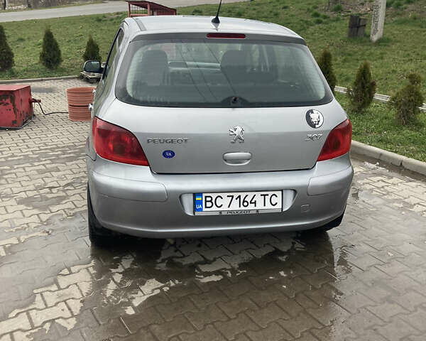 Серый Пежо 307, объемом двигателя 2 л и пробегом 351 тыс. км за 3100 $, фото 4 на Automoto.ua