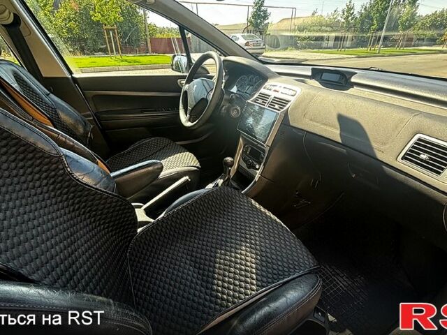 Сірий Пежо 307, об'ємом двигуна 2 л та пробігом 225 тис. км за 4200 $, фото 2 на Automoto.ua