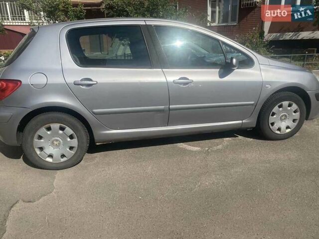 Серый Пежо 307, объемом двигателя 1.6 л и пробегом 246 тыс. км за 3500 $, фото 1 на Automoto.ua