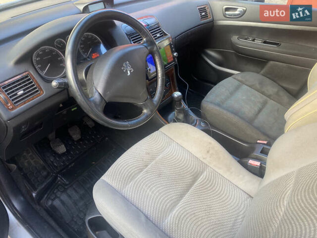 Серый Пежо 307, объемом двигателя 1.4 л и пробегом 200 тыс. км за 2950 $, фото 12 на Automoto.ua
