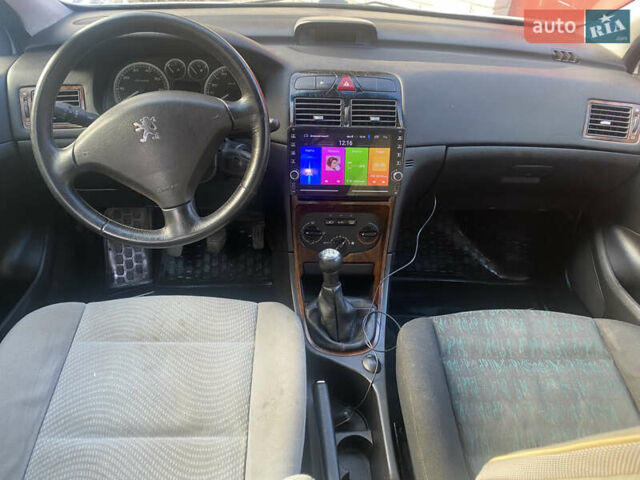 Сірий Пежо 307, об'ємом двигуна 1.4 л та пробігом 200 тис. км за 2850 $, фото 12 на Automoto.ua