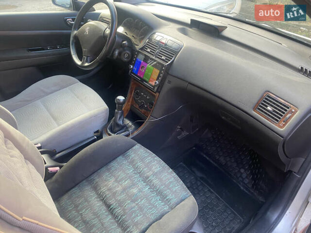 Серый Пежо 307, объемом двигателя 1.4 л и пробегом 200 тыс. км за 2950 $, фото 11 на Automoto.ua