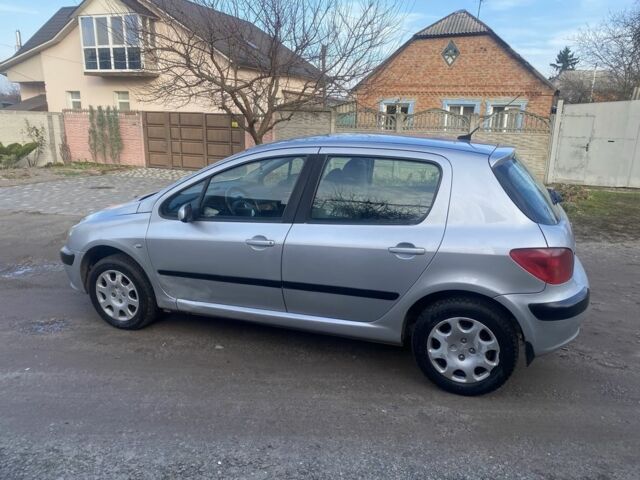 Серый Пежо 307, объемом двигателя 1.4 л и пробегом 200 тыс. км за 2950 $, фото 8 на Automoto.ua