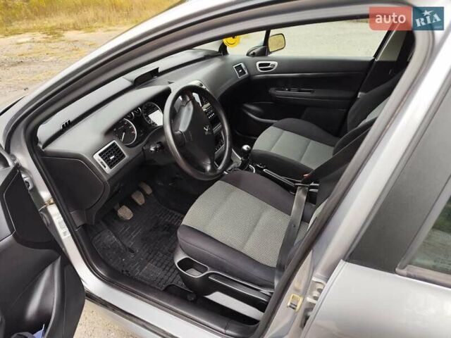 Серый Пежо 307, объемом двигателя 1.59 л и пробегом 146 тыс. км за 4300 $, фото 11 на Automoto.ua