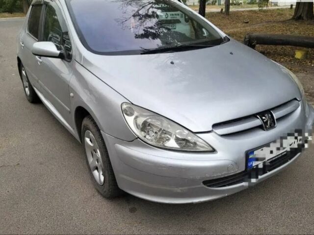 Серый Пежо 307, объемом двигателя 1.6 л и пробегом 288 тыс. км за 4000 $, фото 2 на Automoto.ua