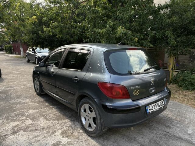 Серый Пежо 307, объемом двигателя 2 л и пробегом 350 тыс. км за 4000 $, фото 2 на Automoto.ua