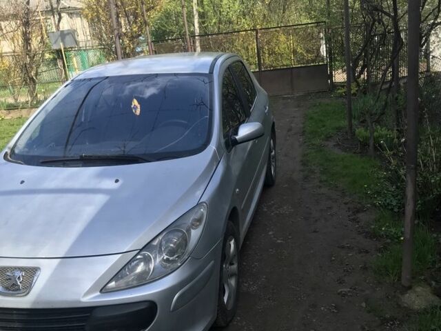 Сірий Пежо 307, об'ємом двигуна 2 л та пробігом 246 тис. км за 3300 $, фото 14 на Automoto.ua