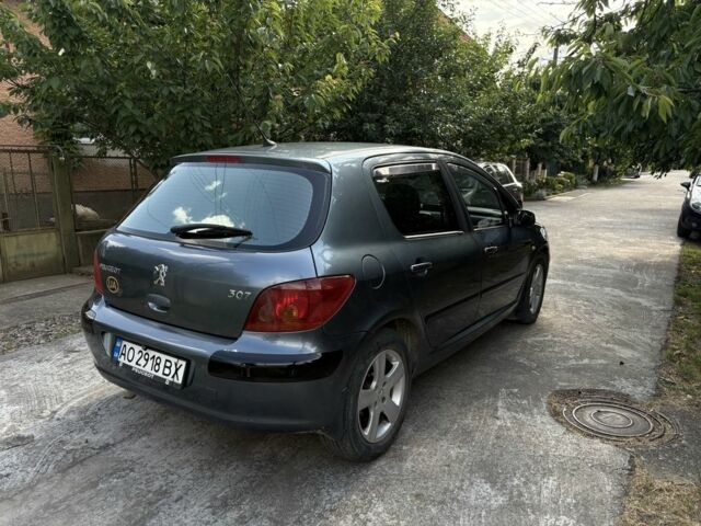 Серый Пежо 307, объемом двигателя 2 л и пробегом 350 тыс. км за 4000 $, фото 3 на Automoto.ua