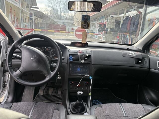 Серый Пежо 307, объемом двигателя 2 л и пробегом 180 тыс. км за 5300 $, фото 4 на Automoto.ua