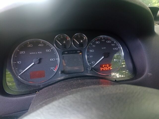 Серый Пежо 307, объемом двигателя 1.6 л и пробегом 342 тыс. км за 3200 $, фото 2 на Automoto.ua