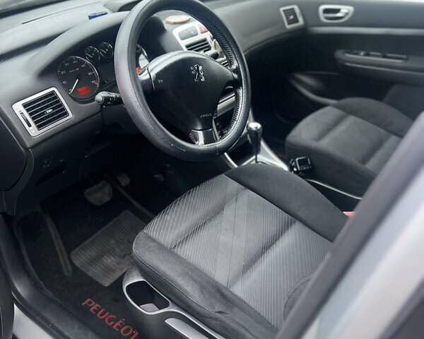 Серый Пежо 307, объемом двигателя 1.59 л и пробегом 246 тыс. км за 3600 $, фото 4 на Automoto.ua