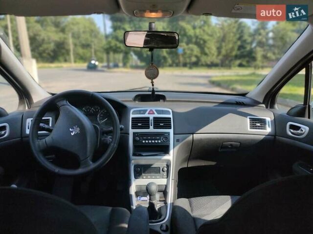 Серый Пежо 307, объемом двигателя 2 л и пробегом 233 тыс. км за 4199 $, фото 9 на Automoto.ua