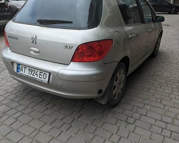 Серый Пежо 307, объемом двигателя 1.59 л и пробегом 193 тыс. км за 4100 $, фото 1 на Automoto.ua