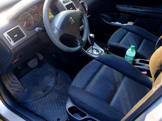 Серый Пежо 307, объемом двигателя 2 л и пробегом 230 тыс. км за 4000 $, фото 2 на Automoto.ua