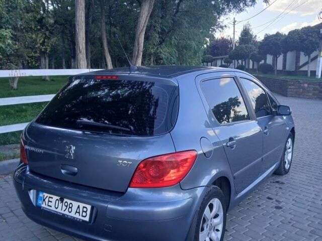 Серый Пежо 307, объемом двигателя 2 л и пробегом 193 тыс. км за 4500 $, фото 3 на Automoto.ua